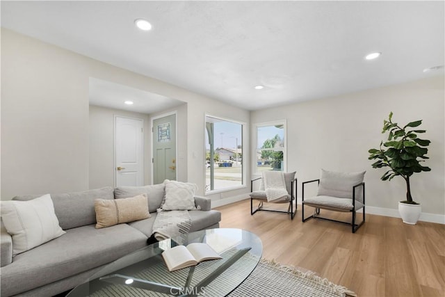 1347 W Princeton St, Ontario, CA 91762 - living area featuring light wood-style flooring and recessed lighting