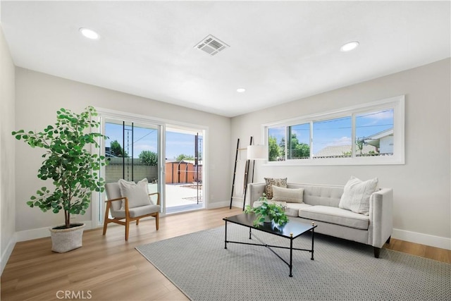 1347 W Princeton St, Ontario, CA 91762 - living room with plenty of natural light, light wood finished floors, and recessed lighting