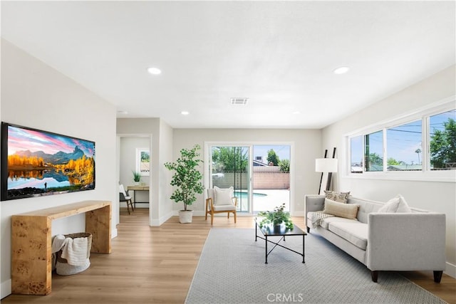 1347 W Princeton St, Ontario, CA 91762 - living area featuring light wood-style floors and recessed lighting