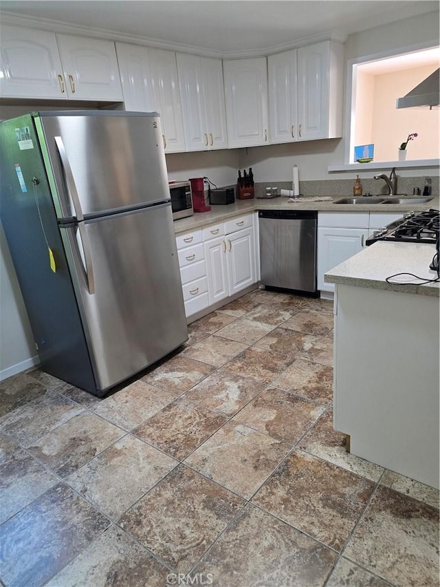 4163 Stotts St, Riverside, CA 92503 - kitchen featuring stainless steel appliances, white cabinets, and light stone finish floors