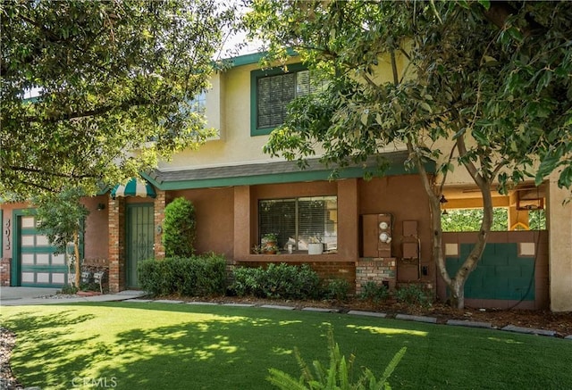 304 S Minnesota Ave, Glendora, CA 91741 - view of front of house with a front lawn, stucco siding, and an attached garage