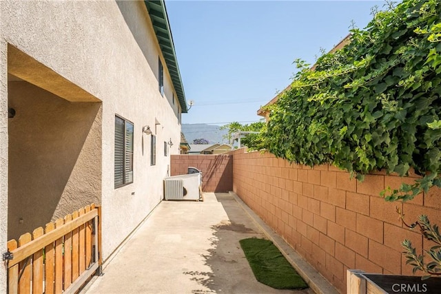 304 S Minnesota Ave, Glendora, CA 91741 - view of side of property featuring stucco siding, a fenced backyard, and a patio