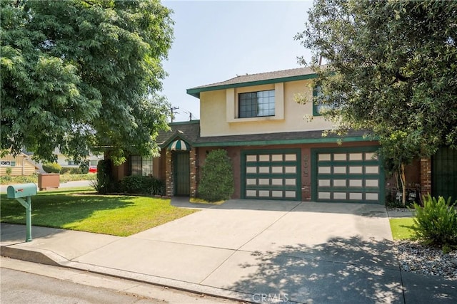 304 S Minnesota Ave, Glendora, CA 91741 - view of front facade featuring stucco siding, driveway, a garage, and a front lawn