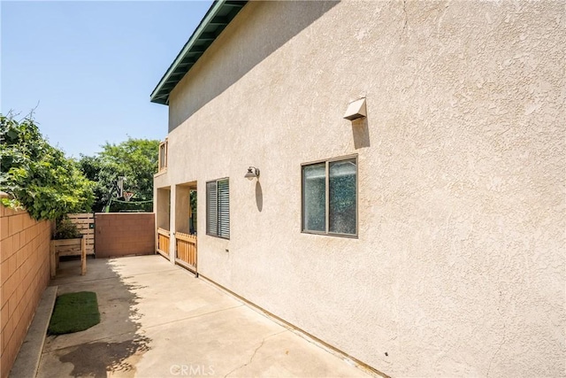 304 S Minnesota Ave, Glendora, CA 91741 - view of property exterior with stucco siding and a patio