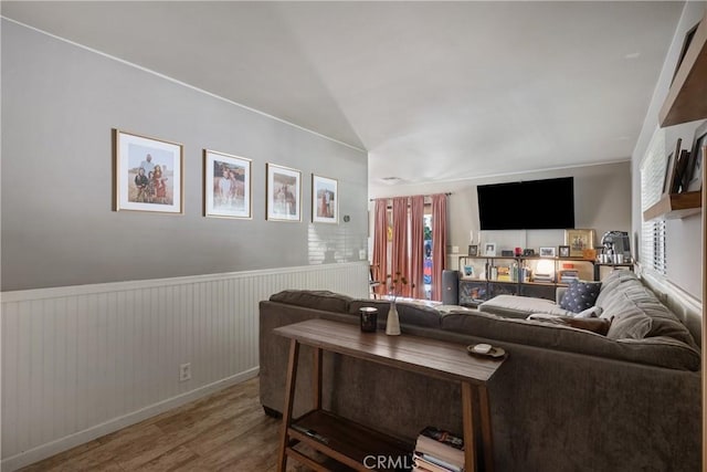 304 S Minnesota Ave, Glendora, CA 91741 - living room with wood finished floors, a wainscoted wall, and lofted ceiling
