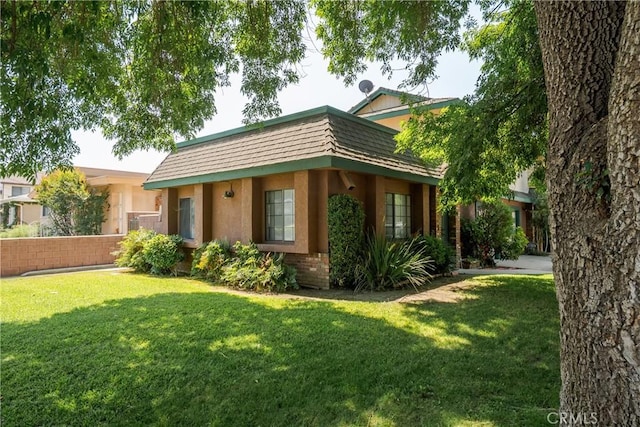 304 S Minnesota Ave, Glendora, CA 91741 - view of front facade with a front yard and stucco siding