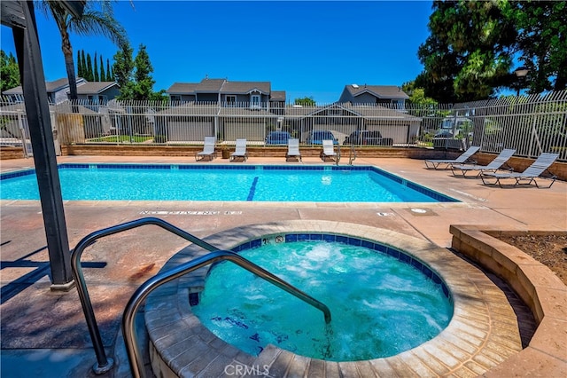 818 Live Oak Pl, Corona, CA 92882 - community pool featuring a hot tub, a patio, and a residential view