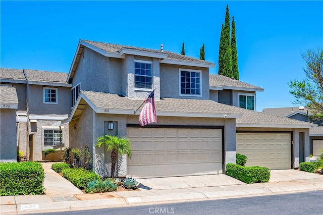 818 Live Oak Pl, Corona, CA 92882 - view of front of property featuring driveway, stucco siding, and a garage