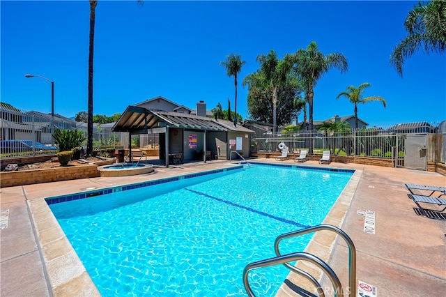 818 Live Oak Pl, Corona, CA 92882 - community pool featuring a patio area and a hot tub