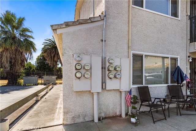 351 W 19th St, Merced, CA 95340 - view of home's exterior with stucco siding and a patio