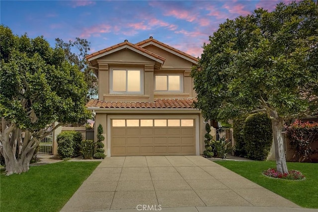 23256 Arelo Ct, Laguna Niguel, CA 92677 - mediterranean / spanish house featuring a garage, stucco siding, a tile roof, and concrete driveway
