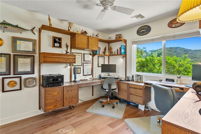23256 Arelo Ct, Laguna Niguel, CA 92677 - office with light wood-style flooring, a ceiling fan, and built in desk