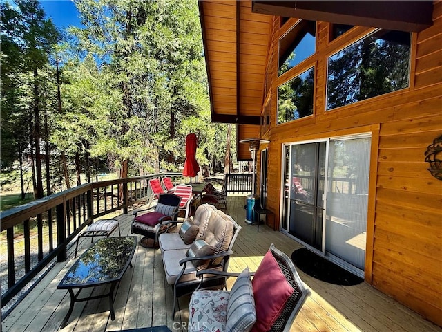 9312 Mountain Meadow Rd, Shingletown, CA 96088 - wooden terrace with an outdoor living space