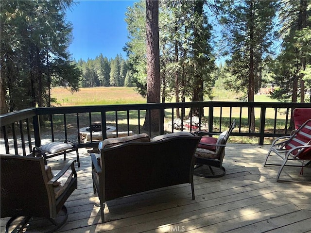 9312 Mountain Meadow Rd, Shingletown, CA 96088 - wooden deck with outdoor lounge area