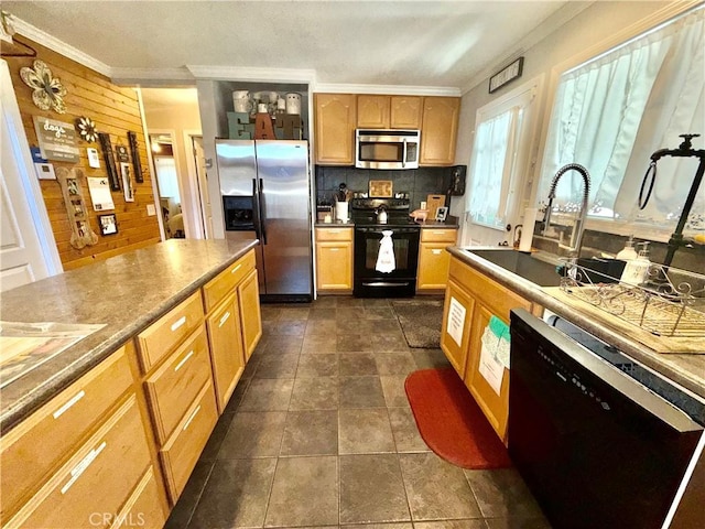 9312 Mountain Meadow Rd, Shingletown, CA 96088 - kitchen with black appliances, crown molding, decorative backsplash, and wood walls