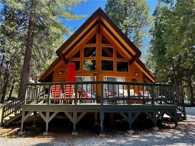 9312 Mountain Meadow Rd, Shingletown, CA 96088 - rear view of property featuring a wooden deck