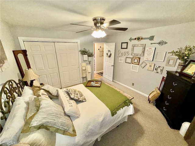 9312 Mountain Meadow Rd, Shingletown, CA 96088 - bedroom featuring a closet, carpet, and ceiling fan