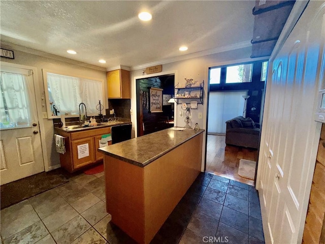 9312 Mountain Meadow Rd, Shingletown, CA 96088 - kitchen with ornamental molding, dark countertops, a peninsula, recessed lighting, and a textured ceiling