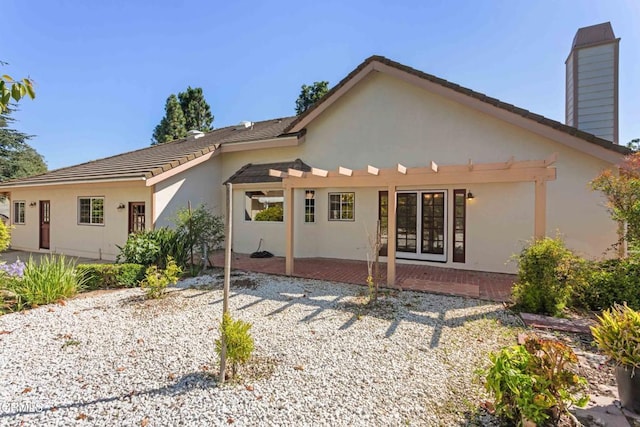 2000 Morongo Dr, Camarillo, CA 93012 - back of property featuring a chimney, a patio, and stucco siding