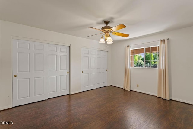 2000 Morongo Dr, Camarillo, CA 93012 - unfurnished bedroom featuring dark wood-style flooring, two closets, and a ceiling fan