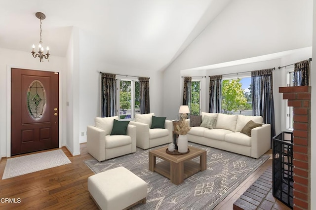 2000 Morongo Dr, Camarillo, CA 93012 - living area with wood finished floors, a chandelier, and high vaulted ceiling