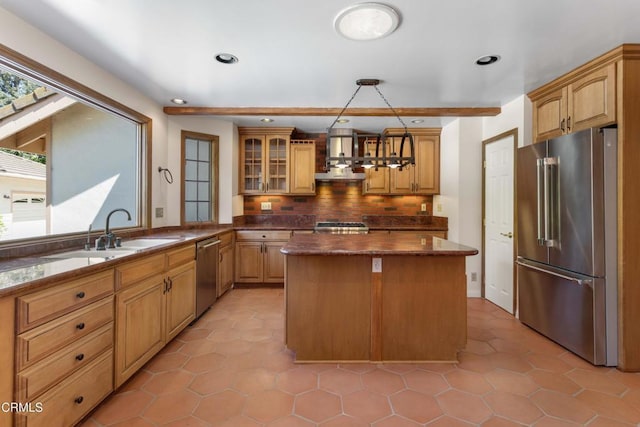 2000 Morongo Dr, Camarillo, CA 93012 - kitchen with stainless steel appliances, backsplash, a center island, exhaust hood, and recessed lighting