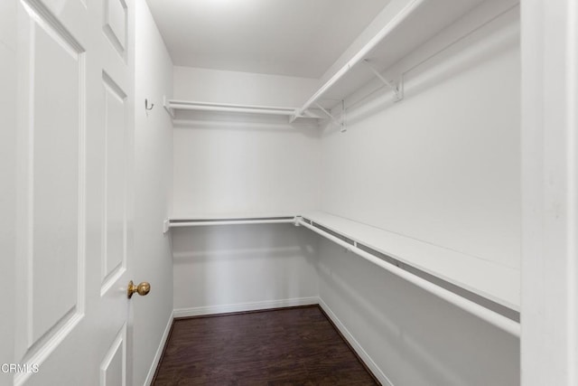 2000 Morongo Dr, Camarillo, CA 93012 - walk in closet featuring dark wood-type flooring