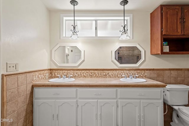 2000 Morongo Dr, Camarillo, CA 93012 - full bath with tile walls, double vanity, and wainscoting