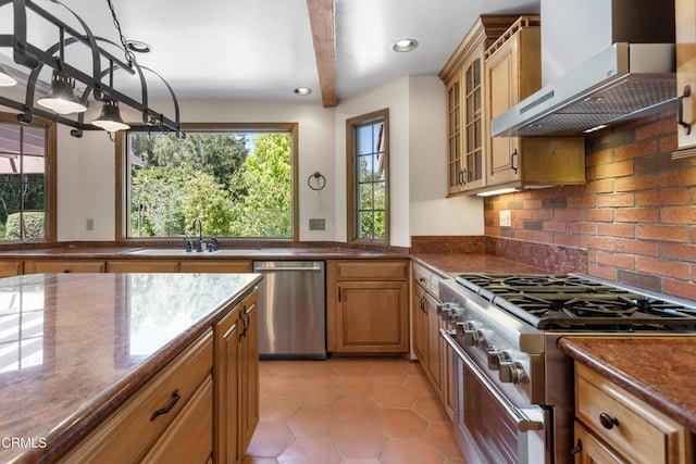 2000 Morongo Dr, Camarillo, CA 93012 - kitchen with stainless steel appliances, wall chimney range hood, light tile patterned floors, tasteful backsplash, and recessed lighting