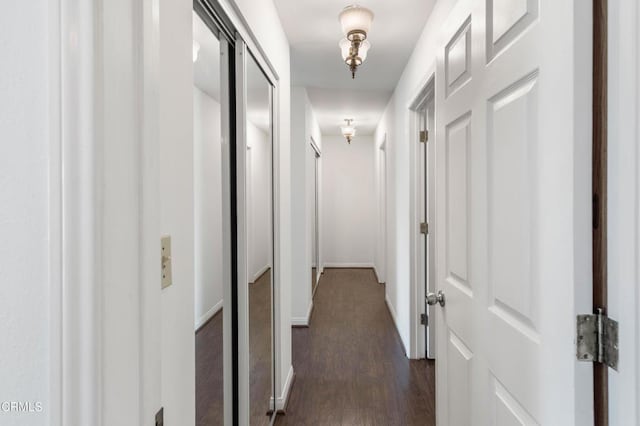 2000 Morongo Dr, Camarillo, CA 93012 - hall with dark wood-style floors and baseboards