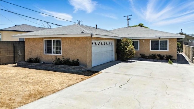 11813 Colima Rd, Whittier, CA 90604 - ranch-style home with a garage, stucco siding, and concrete driveway