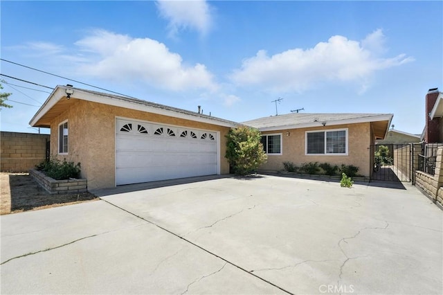 11813 Colima Rd, Whittier, CA 90604 - ranch-style house featuring stucco siding, concrete driveway, and an attached garage