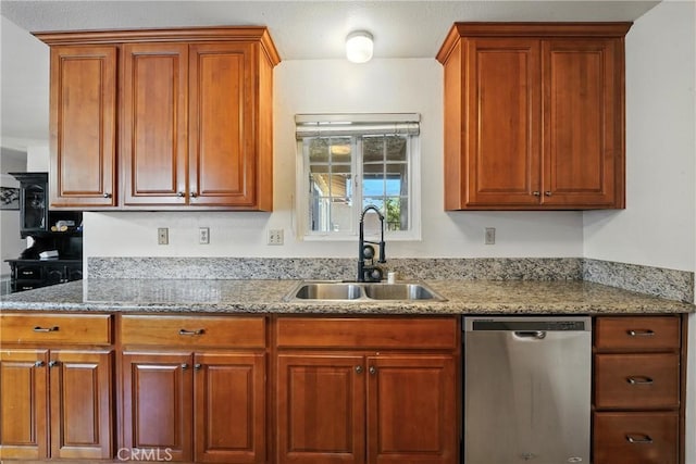 11813 Colima Rd, Whittier, CA 90604 - kitchen with stainless steel dishwasher, light stone counters, and brown cabinets