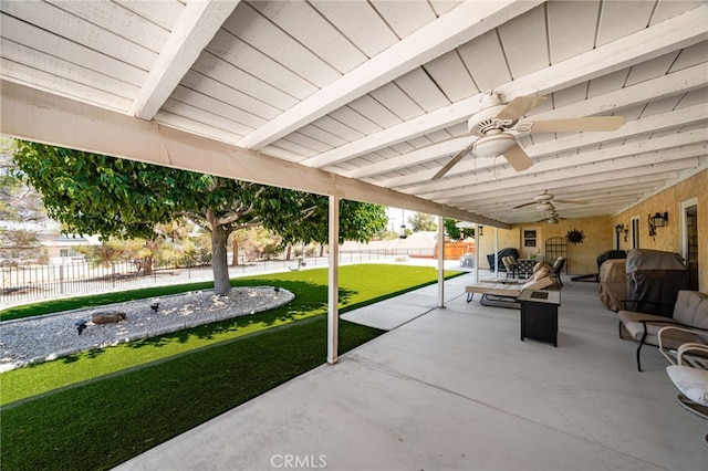 19082 Tecumseh Rd, Apple Valley, CA 92307 - fenced backyard featuring ceiling fan, a patio area, and grilling area