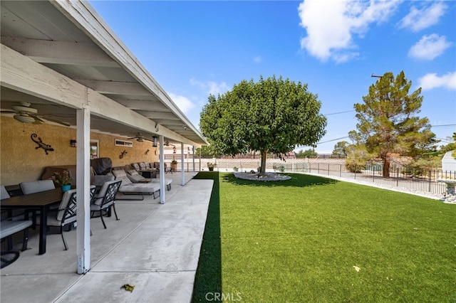 19082 Tecumseh Rd, Apple Valley, CA 92307 - view of yard with ceiling fan, outdoor lounge area, and a patio area