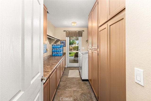 19082 Tecumseh Rd, Apple Valley, CA 92307 - washroom featuring washer / dryer and cabinet space