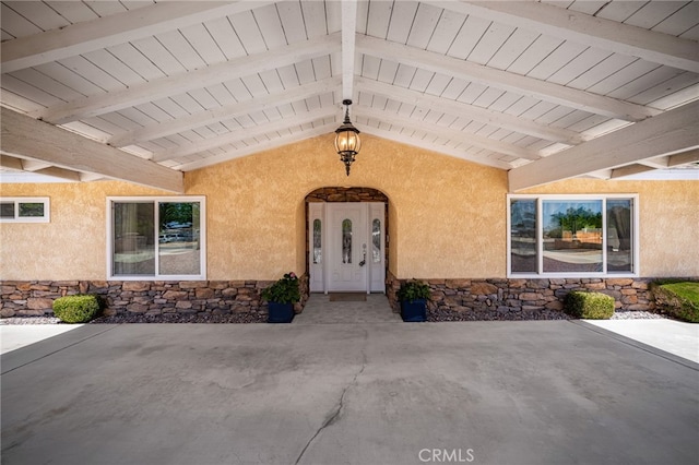19082 Tecumseh Rd, Apple Valley, CA 92307 - view of exterior entry featuring stone siding and stucco siding