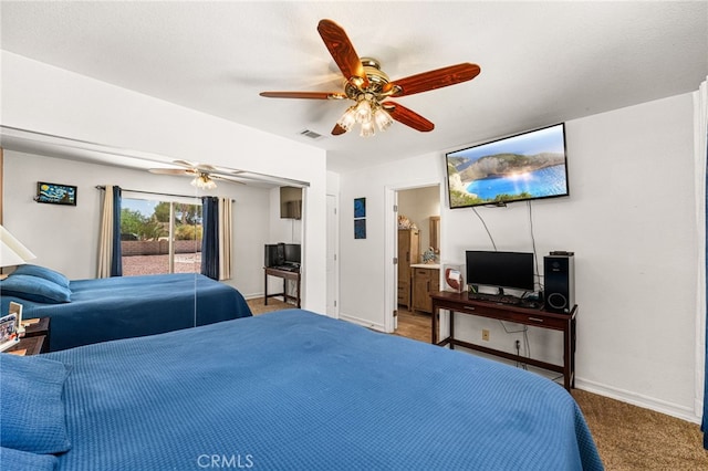 19082 Tecumseh Rd, Apple Valley, CA 92307 - bedroom featuring ceiling fan, carpet, ensuite bathroom, and access to outside