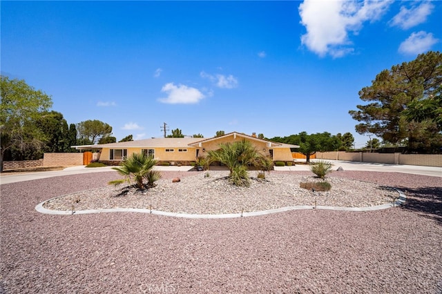 19082 Tecumseh Rd, Apple Valley, CA 92307 - ranch-style house with stucco siding and concrete driveway