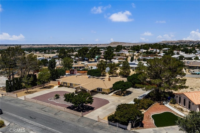 19082 Tecumseh Rd, Apple Valley, CA 92307 - aerial perspective of suburban area with a mountainous background