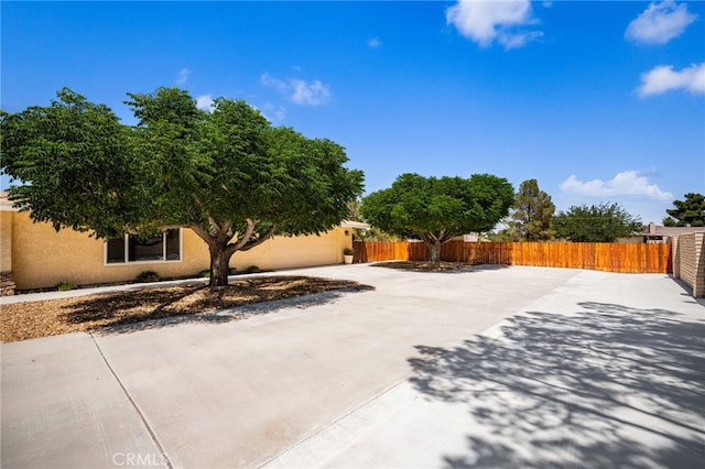 19082 Tecumseh Rd, Apple Valley, CA 92307 - view of patio / terrace with an attached garage and concrete driveway