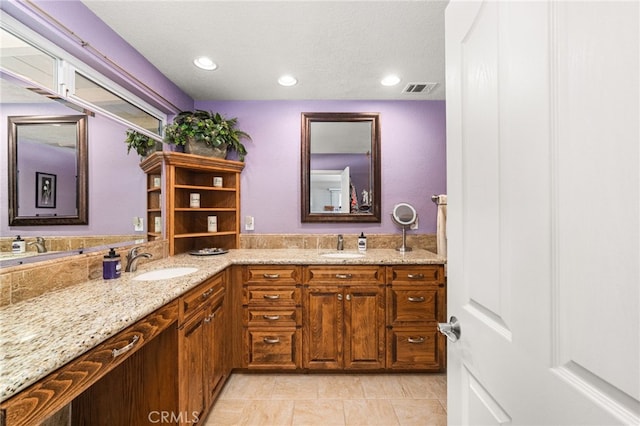 19082 Tecumseh Rd, Apple Valley, CA 92307 - full bathroom with double vanity and recessed lighting