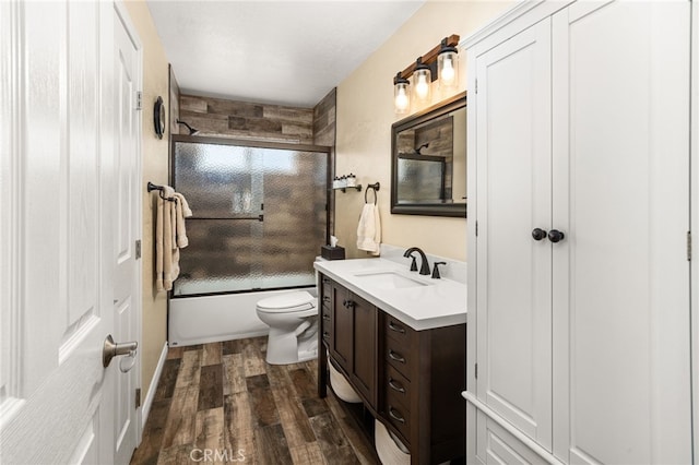 19082 Tecumseh Rd, Apple Valley, CA 92307 - full bath with vanity, combined bath / shower with glass door, and wood finished floors