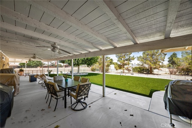 19082 Tecumseh Rd, Apple Valley, CA 92307 - fenced backyard with outdoor dining space, a patio area, ceiling fan, and area for grilling