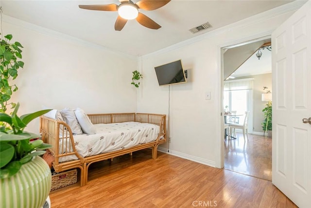 417 N Lamer St, Burbank, CA 91506 - bedroom with light wood-type flooring, crown molding, and ceiling fan