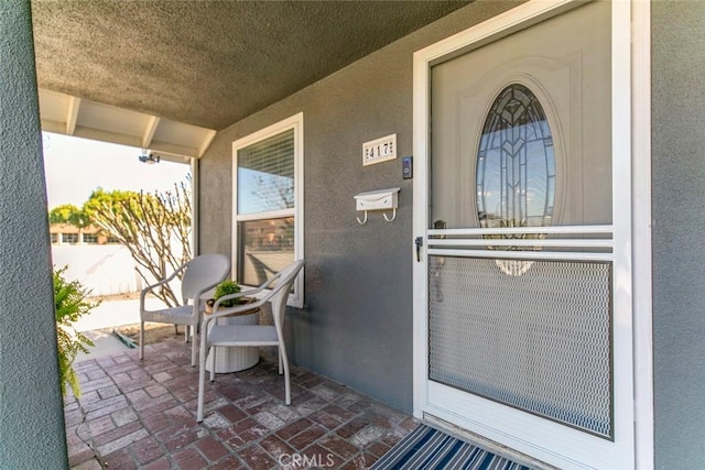 417 N Lamer St, Burbank, CA 91506 - doorway to property with stucco siding and covered porch