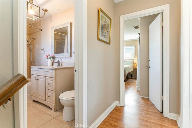 417 N Lamer St, Burbank, CA 91506 - full bath with vanity, a shower, wood finished floors, and connected bathroom