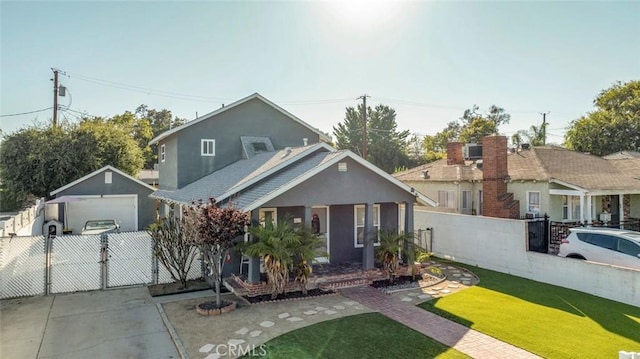 417 N Lamer St, Burbank, CA 91506 - view of front of house featuring a detached garage, a gate, concrete driveway, stucco siding, and an outbuilding