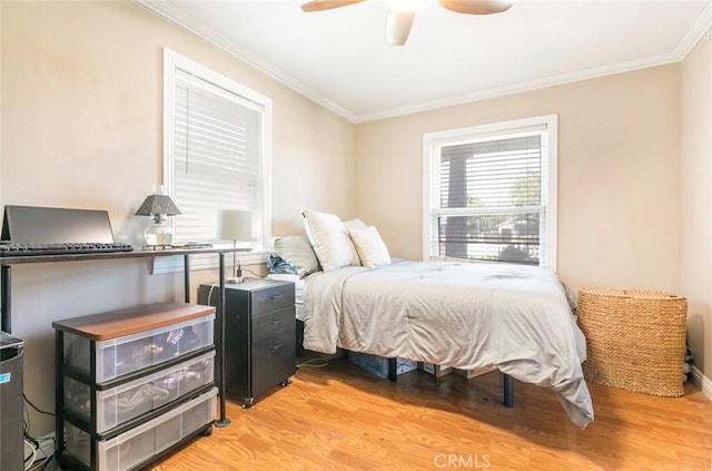 417 N Lamer St, Burbank, CA 91506 - bedroom with light wood-style flooring, ornamental molding, and a ceiling fan