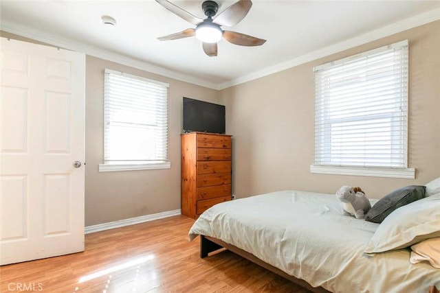 417 N Lamer St, Burbank, CA 91506 - bedroom with multiple windows, light wood-type flooring, crown molding, and a ceiling fan